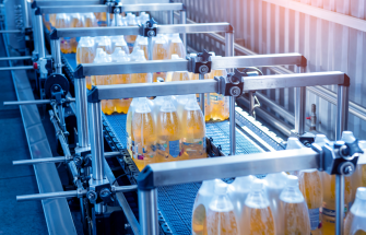 Plastic bottles on a packaging line in a production plant